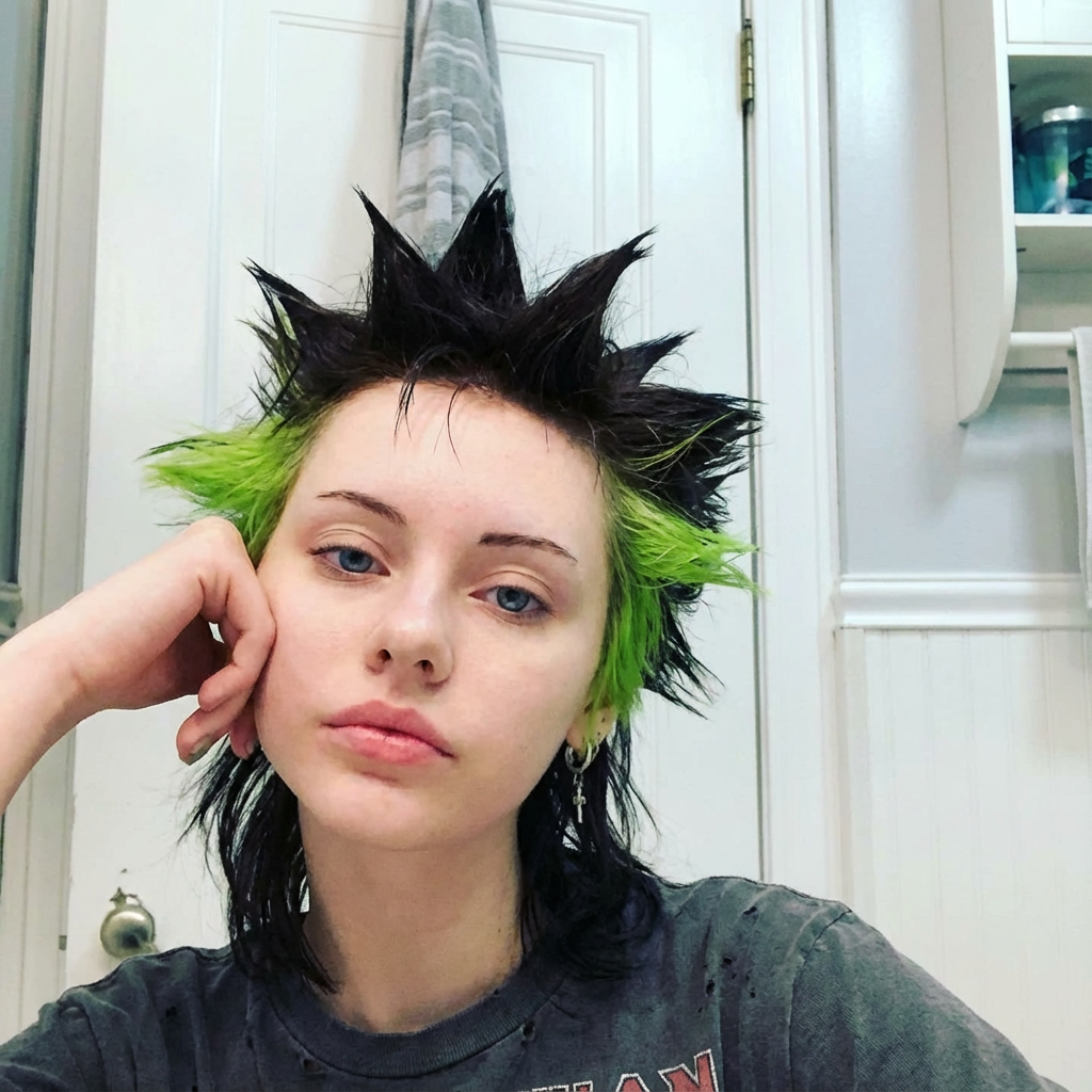 Close-up indoor selfie showing short black and neon-green liberty spikes with textured layers generated by blondefilter.net