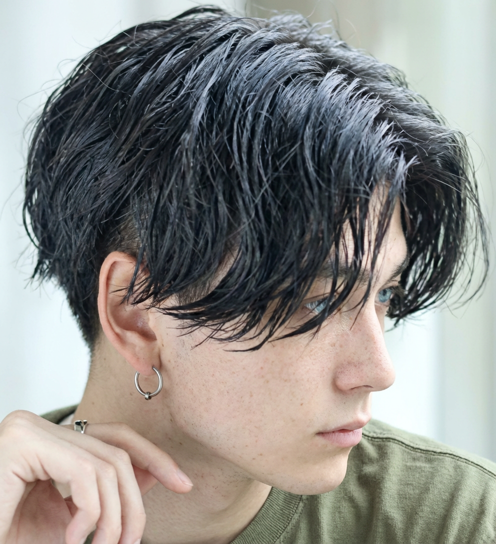 Close-up of wet-look two block middle part with subtle undercut and hoop earring generated by blondefilter.net